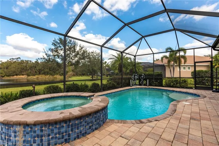 View of pool from the Lanai on one of the largest lots in the neighborhood.