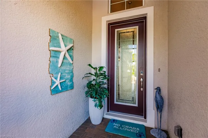 ENTER THE MOST BEAUTIFUL HOME IN PELICAN PRESERVE WITH OVER $200,000 IN HOME IMPROVEMENTS & BUILDER UPGRADES!