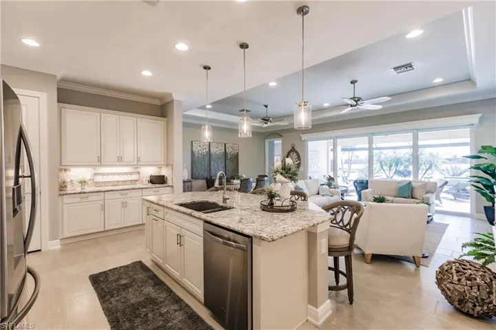 TOTALLY OPEN CONCEPT WITH UPGRADED 12 x 24 TILE FLOORING & PLENTY OF ROOM TO ENTERTAIN!