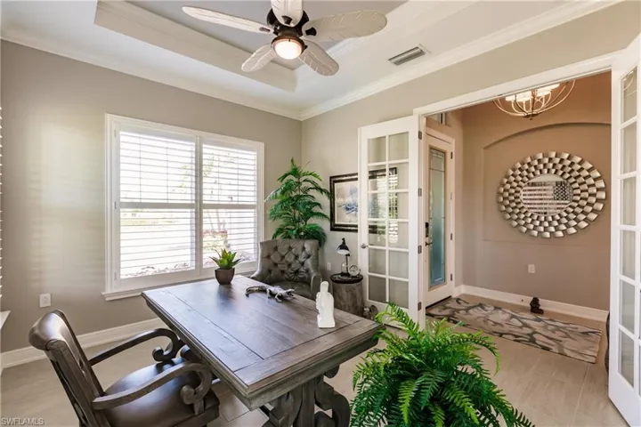 THE 4TH BEDROOM/OFFICE IS LOCATED AT THE FRONT OF THE HOME NEAR THE BREATHTAKING ENTRYWAY!