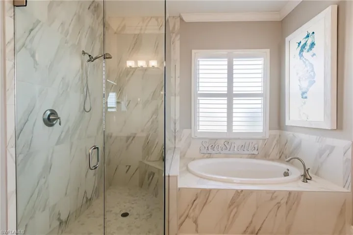 CLOSE-UP VIEW OF THE DETAIL & HIGH LEVEL OF QUALITY IN THE SHOWER & TUB!