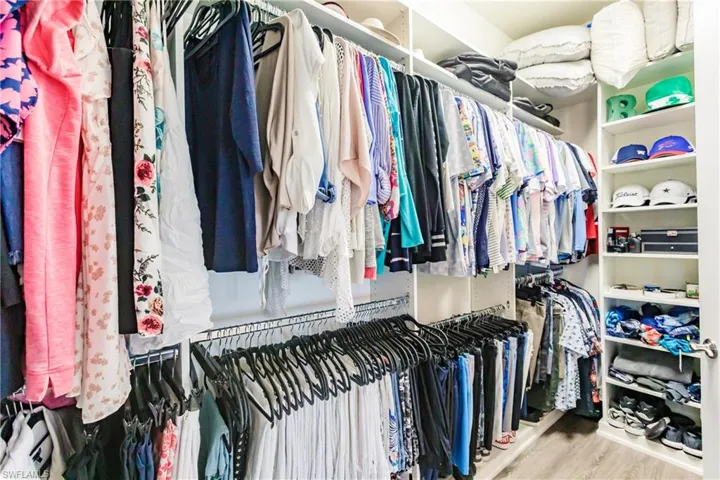 MASTER CUSTOM CLOSET IS EXTREMELY WELL ORGANIZED!