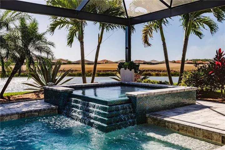 AMAZINGLY BEAUTIFUL 8 FT. SPA WITH WATERFALL EFFECT! PICTURE WINDOWS IN FRONT & BOTH SIDES TO TOTALLY ENJOY THE AMAZING VIEW & LANDSCAPING!