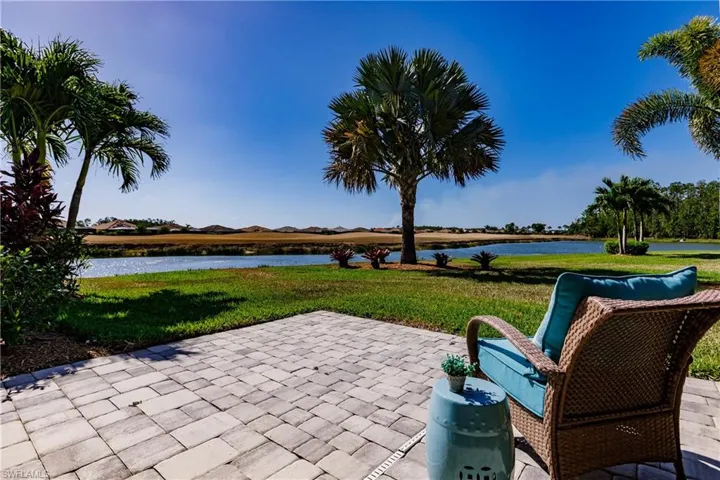 EXTRA BENEFIT: A LARGE PAVERED AREA OUTSIDE OF THE LANAI TO RELAX & ENJOY!