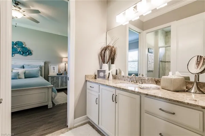 "JACK & JILL" BATHROOM FOR ONLY THE FAMILY TO ENJOY IN PRIVACY. THE HOME ALSO HAS A GUEST BATHROOM IN THE MAIN HALLWAY FOR GUESTS TO USE SEPERATE FROM THE FAMILY'S BATHROOM!