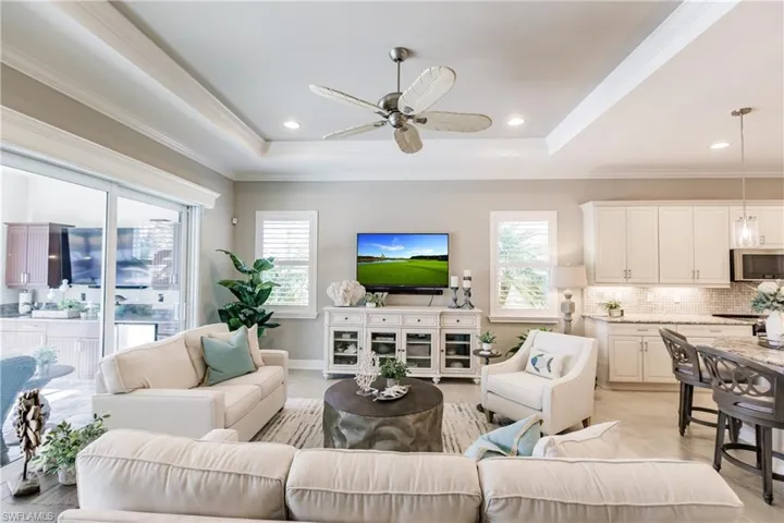 FRAMED CALIFORNIA PLANTATION SHUTTERS THROUGHOUT & LUX TRIM PACKAGE AS SHOWN OVER THE LANAI DOORWAY! THIS HOME HAS IT ALL! MUST BE SEEN IN PERSON TO TRULY APPRECIATE ITS BEAUTY!