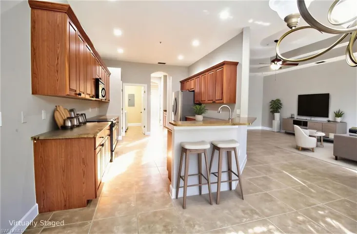 Virtually staged Great Room vieww form Kitchen