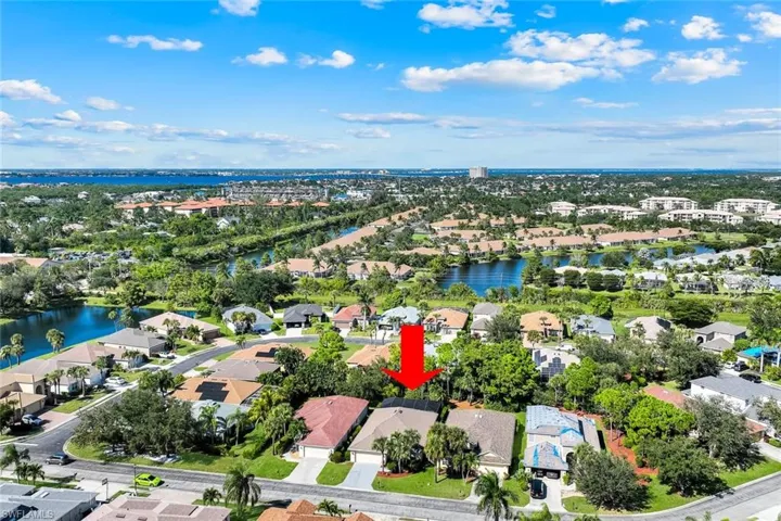 View of property location with nearby suburban area