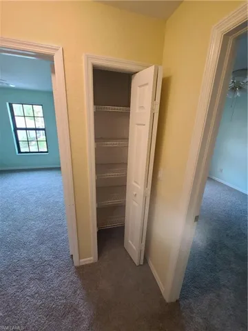 Hallway closet (between bedrooms #'s 2 and 3)