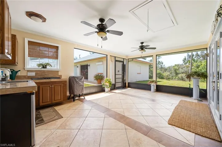 Back screened lania with outdoor kitchen
