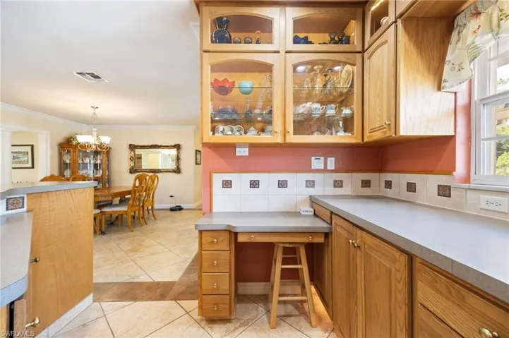 With glass accent cabinets and lighting