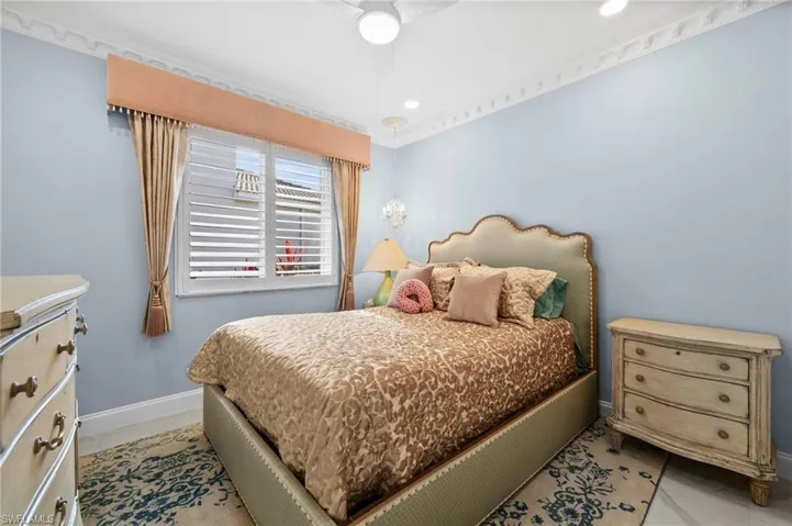 Bedroom featuring ornamental molding