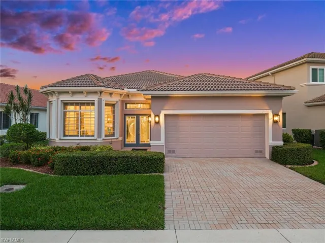 Entrance to this Mediterranean style house with an airconditioned 2-car garage, 3 spacious bedrooms and 3 baths.