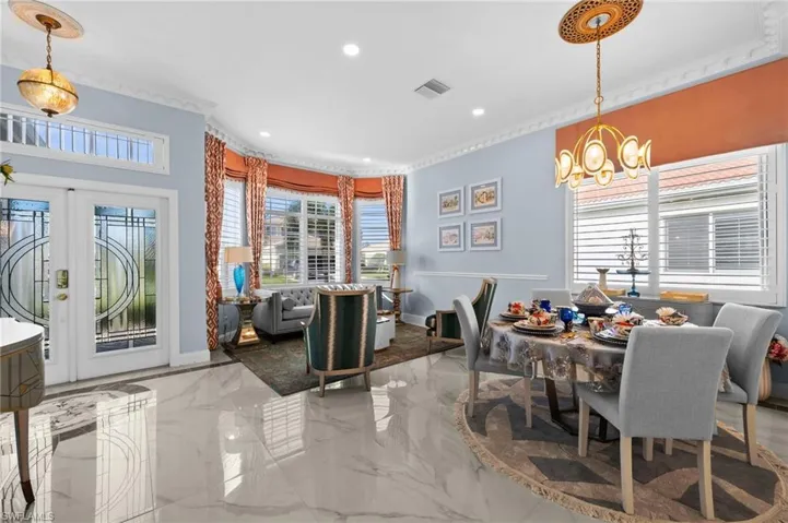 Dining area again highlighting the natural light and amazing lighting fixtures.