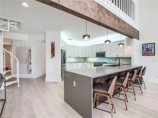 Richly stained hardwood beam contrasts beautifully