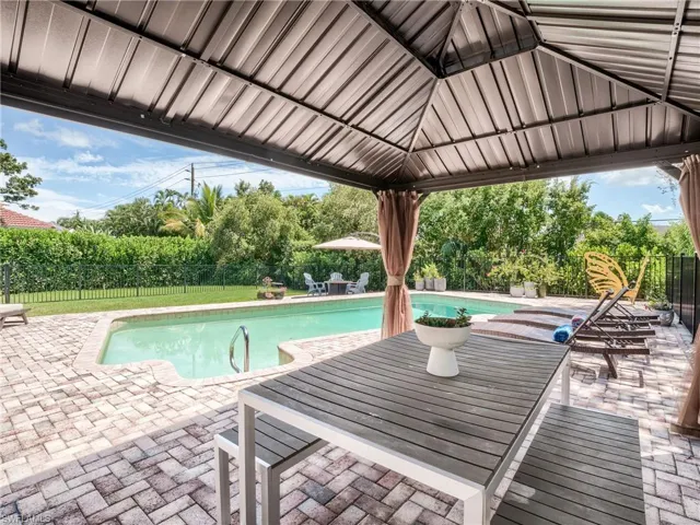 The gazebo seamlessly blends with the yard's design