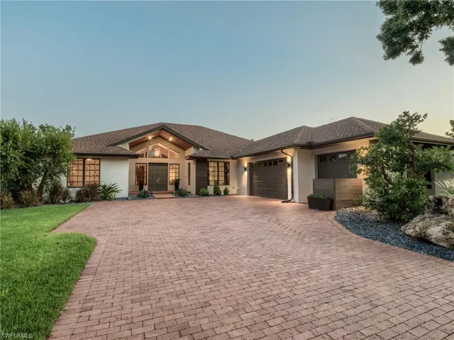 11 CATALPA CT expansive, three-vehicle garage designed to compliment architecture