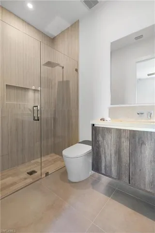 The second in-suite bedroom includes a private bathroom, offering comfort and privacy for guests or family.