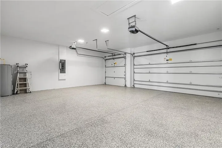 The property includes a three-car garage, providing ample space for vehicles, storage, and additional convenience.