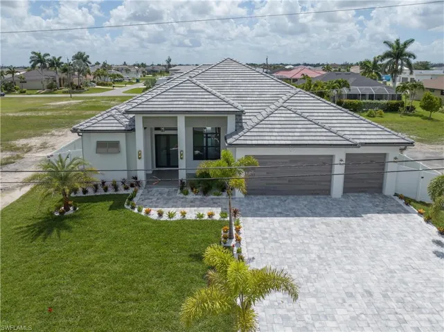 Located near the upcoming SEVEN ISLANDS WATERFRONT COMMUNITY in NW Cape Coral, featuring future marinas, parks, dining, and resort-style amenities, this property offers INCREDIBLE POTENTIAL!!! As development continues, home values are expected to rise, making this A SMART INVESTMENT OPPORTUNITY! Don’t miss your chance to BUILD EQUITY EARLY!