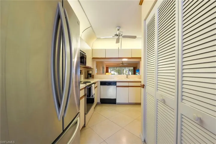 Laundry closet in right in kitchen