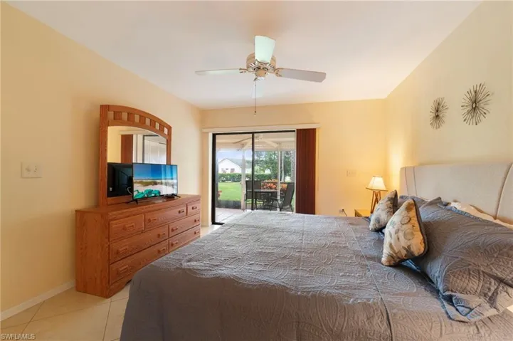 Owner's bedroom with slider access to lanai