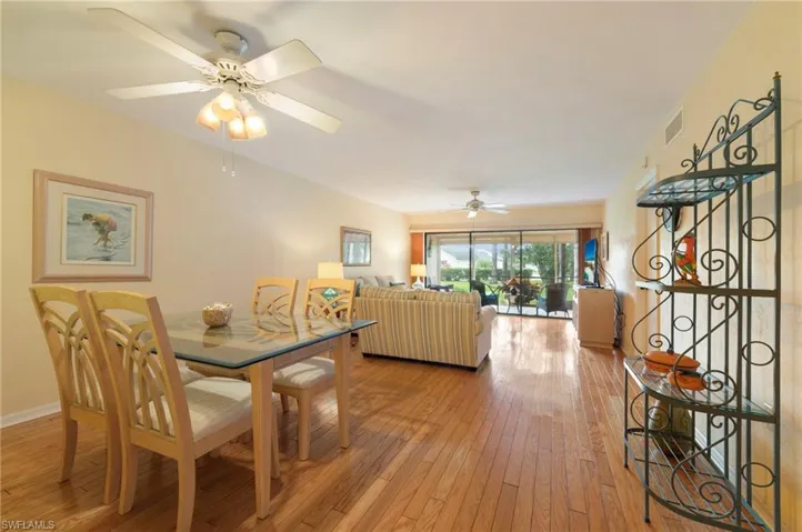 Dining-Living area with ceiling fans