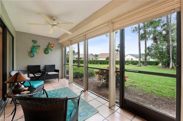 Storm protected lanai with tile flooring is easy to maintain