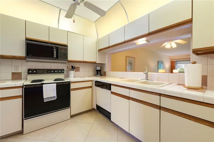 Tiled entry and kitchen area
