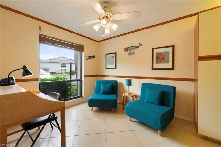 Breakfast nook currently being used as a den area