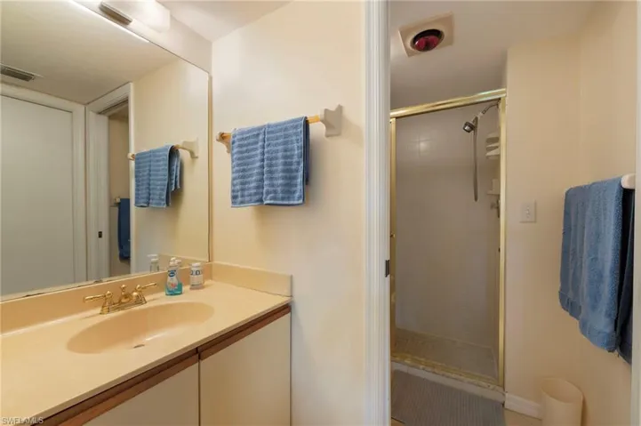 Owner bath with private commode and shower area