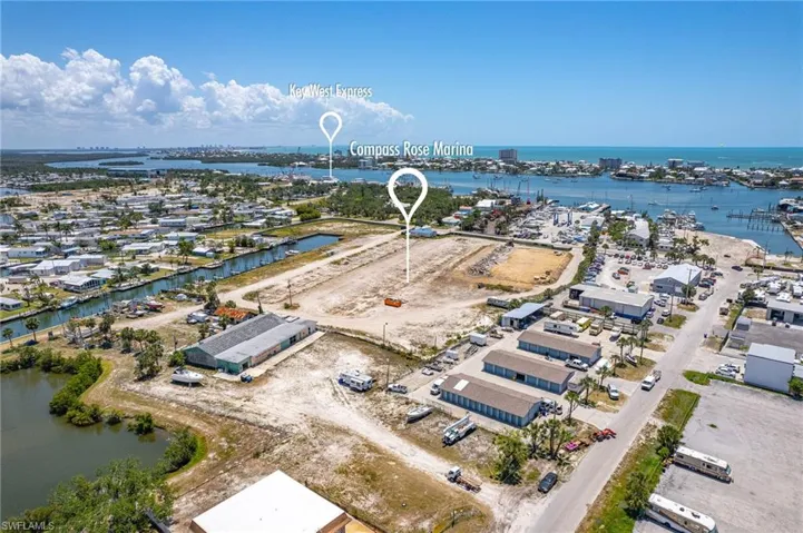 NEW - Compass Rose Marina Complex is next door to the property.