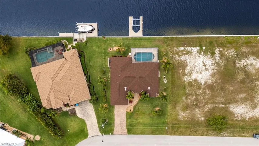 View of subject property featuring a nearby body of water