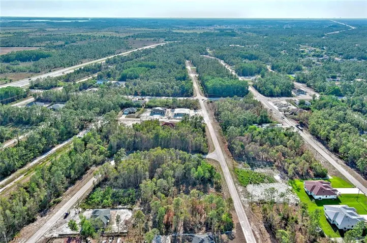 View of property location with a forest