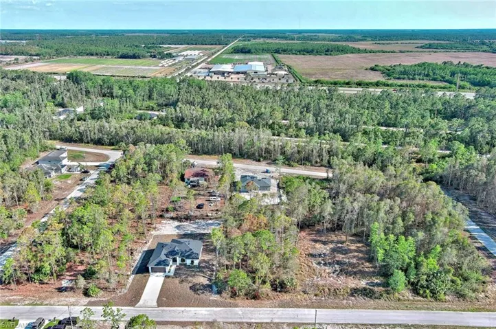 View of property location featuring a heavily wooded area