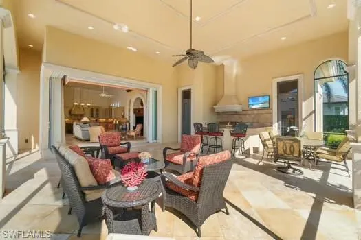 View of patio / terrace featuring ceiling fan and an outdoor hangout area