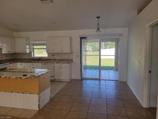 703 NE 31st TER, CAPE CORAL FL 33909