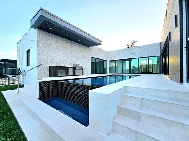 Pool featuring a patio