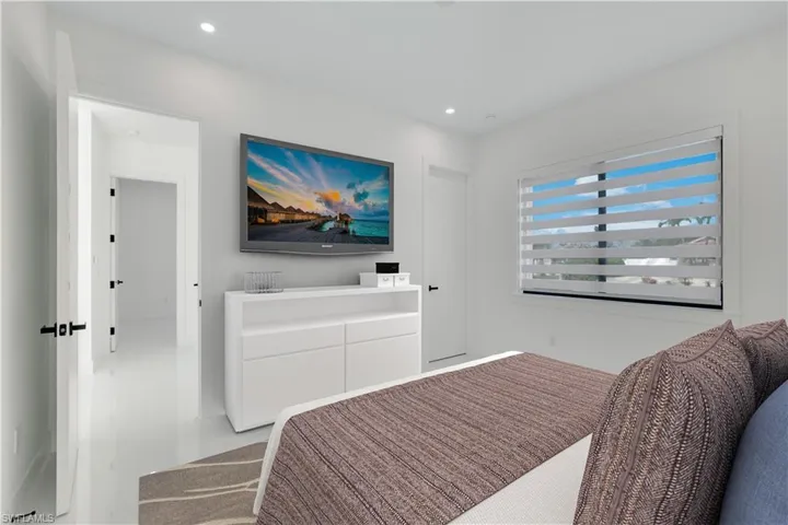 Bedroom featuring recessed lighting