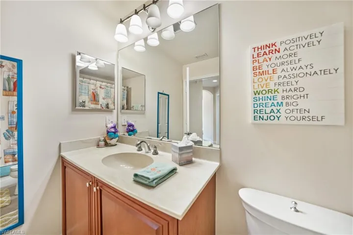 Bathroom with toilet and vanity
