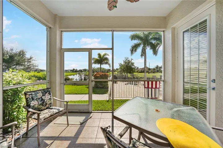 Sunroom featuring ceiling fan