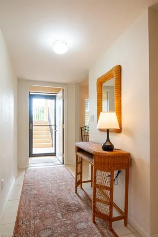 Entryway featuring light tile patterned floors