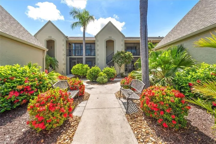 View of exterior entry featuring stucco siding