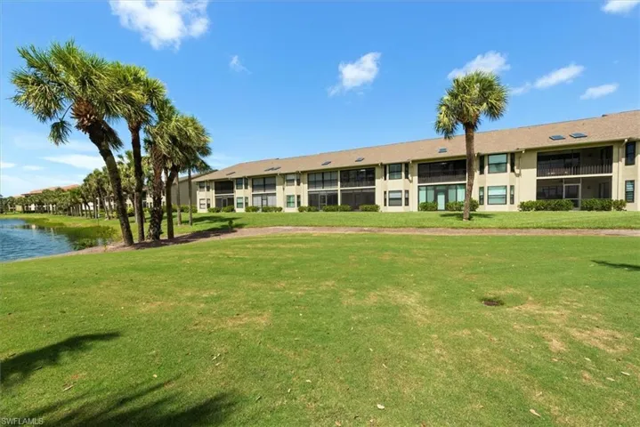 View of property featuring a water view