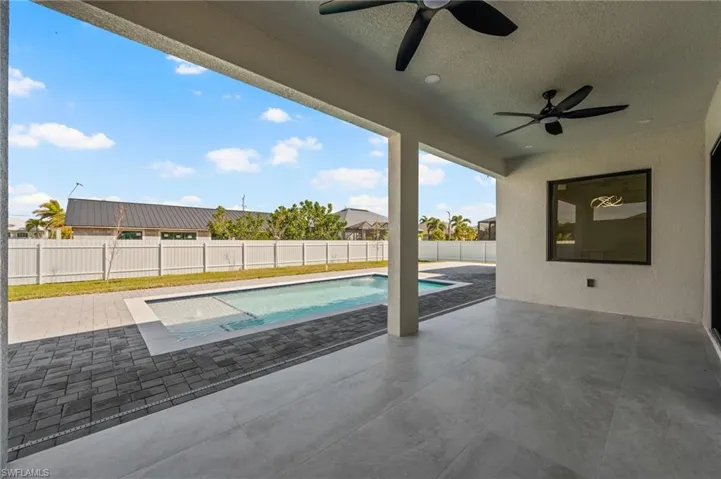 View of pool featuring a fenced backyard, a fenced in pool, and a patio