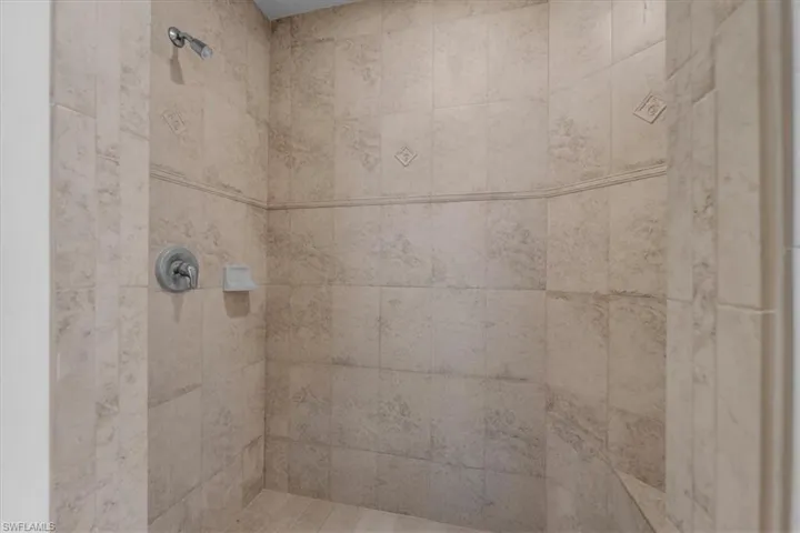 Bathroom with tiled shower