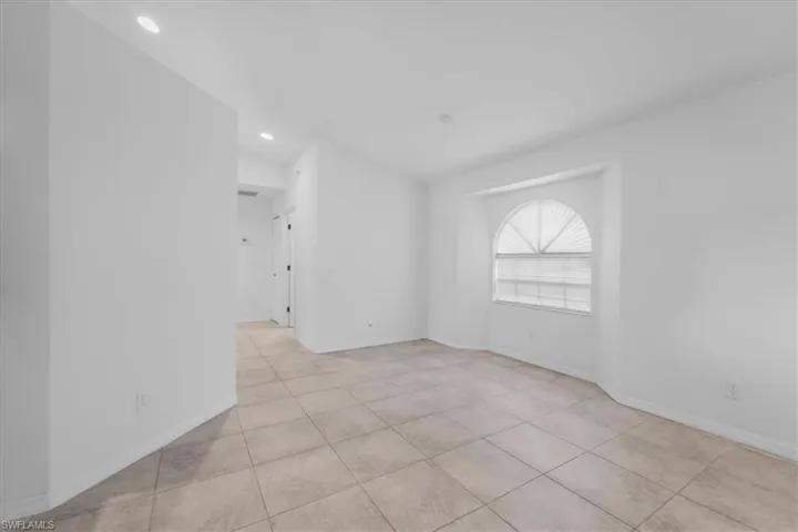 Spare room with recessed lighting and light tile patterned floors