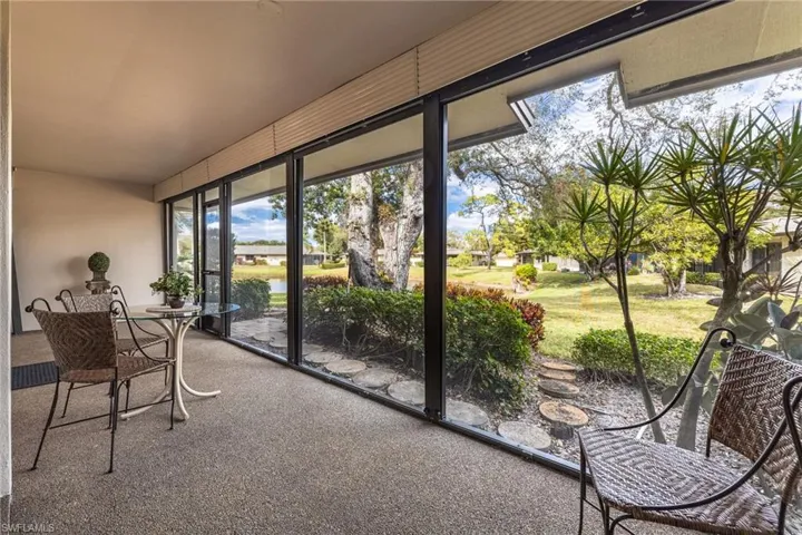Sunroom with carpet floors