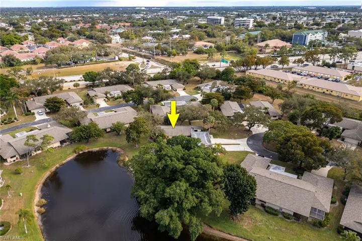 View of property location with nearby suburban area