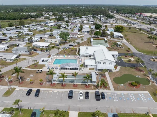 Bird's eye view or community center, pool and parking